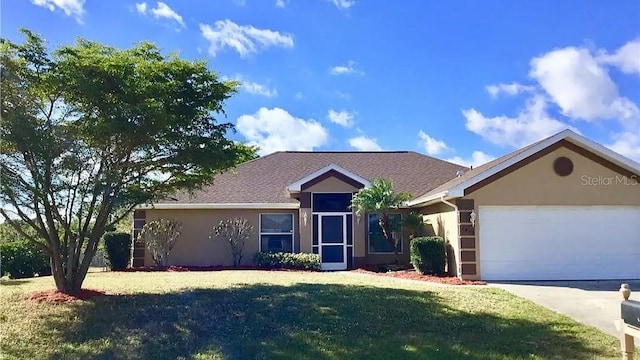 ranch-style home featuring a front yard and a garage