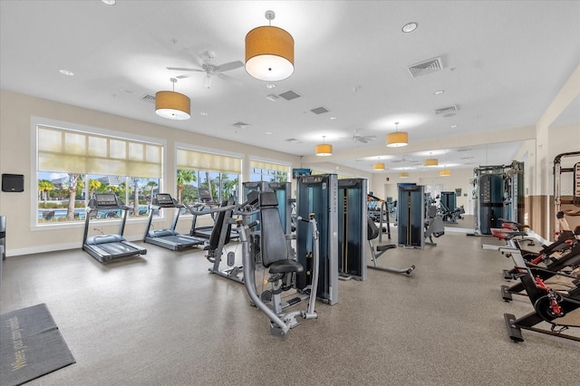 exercise room with ceiling fan