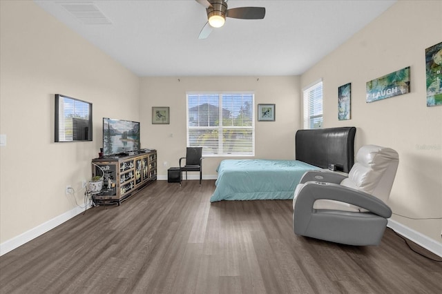 bedroom with wood-type flooring and ceiling fan