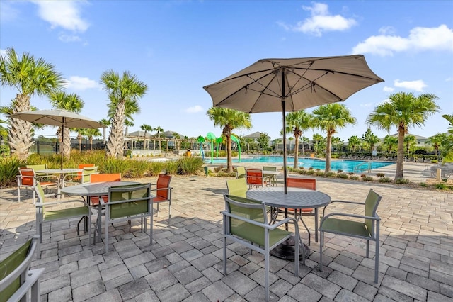 view of patio featuring a community pool