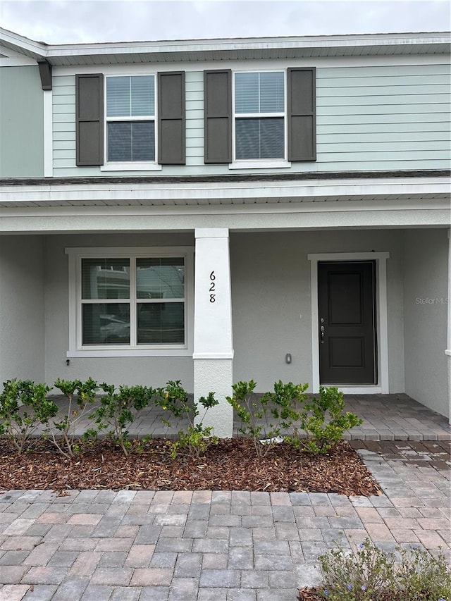 entrance to property with covered porch