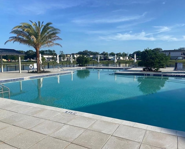 view of swimming pool featuring a patio