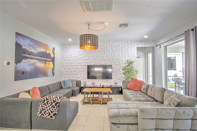 tiled living room with a textured ceiling