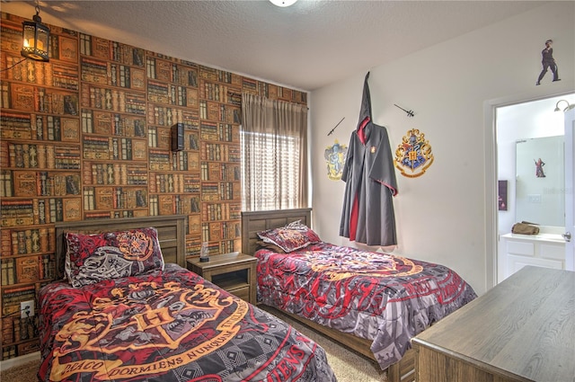 carpeted bedroom with a textured ceiling