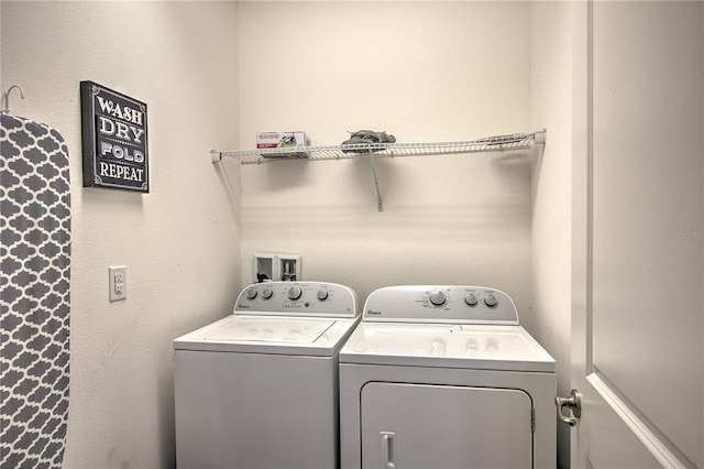 laundry area with separate washer and dryer