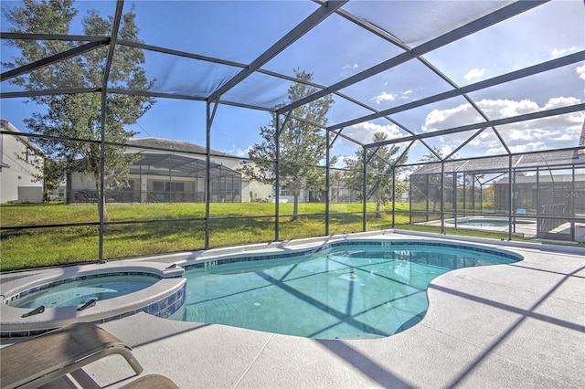 view of swimming pool with glass enclosure, a yard, a patio, and an in ground hot tub