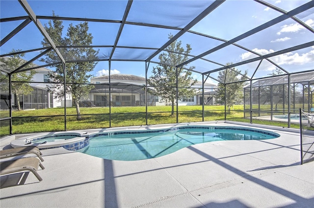 view of swimming pool with a lanai, a lawn, an in ground hot tub, and a patio area