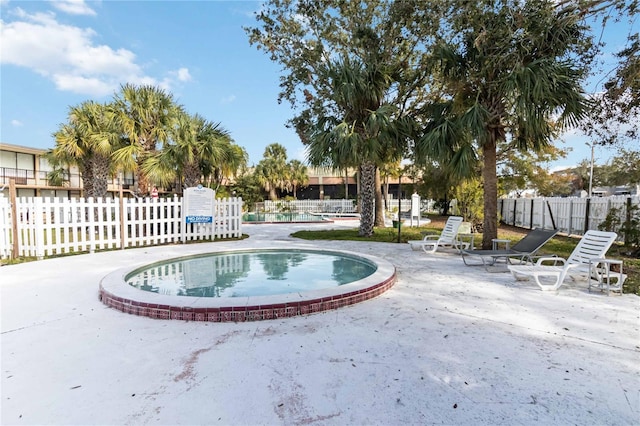 view of pool with a patio