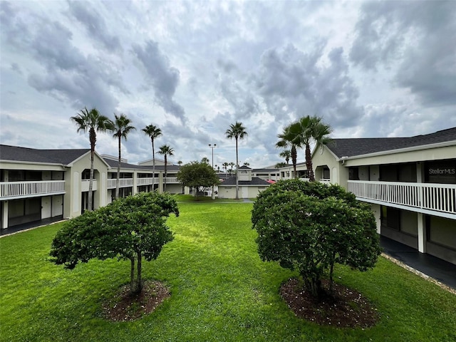 surrounding community featuring a lawn