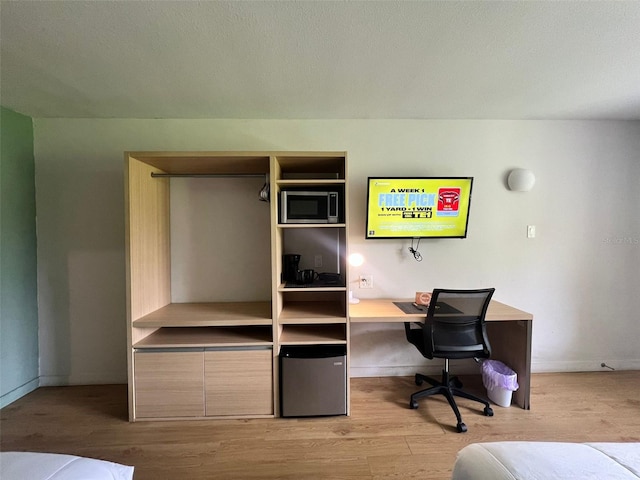 bedroom featuring light wood-type flooring