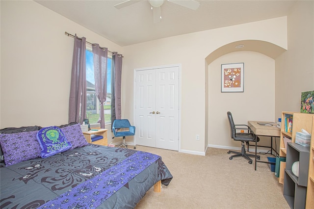 bedroom featuring ceiling fan, carpet flooring, and a closet