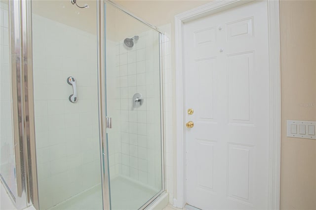 bathroom with an enclosed shower