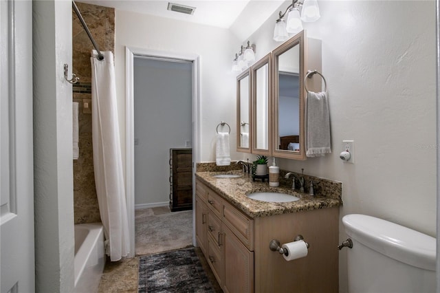 full bathroom with toilet, vanity, and shower / bathtub combination with curtain