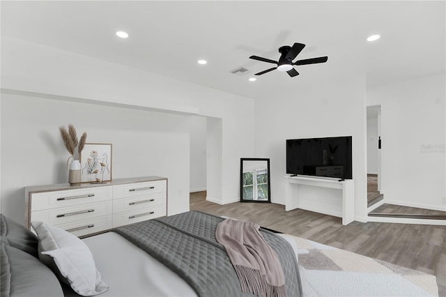 bedroom with light wood-type flooring and ceiling fan