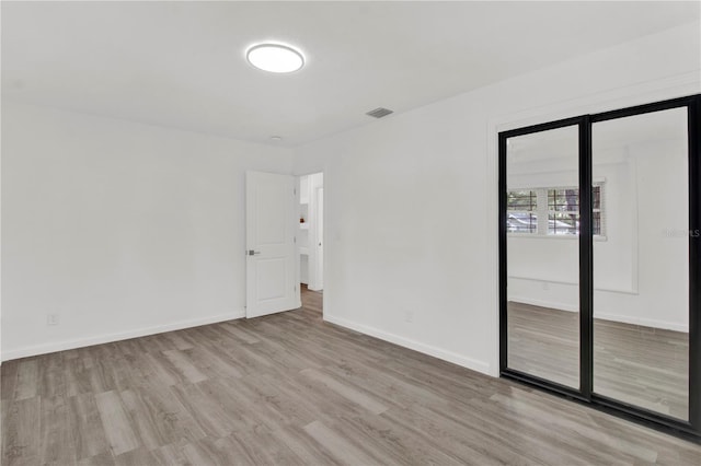 empty room featuring light wood-type flooring