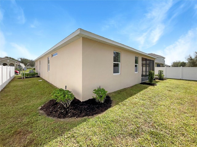 exterior space with a lawn