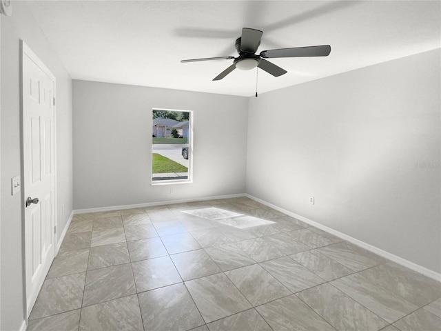 empty room featuring ceiling fan