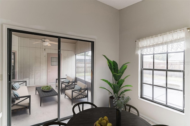 dining room with ceiling fan and a healthy amount of sunlight