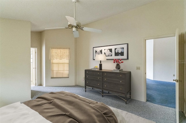 carpeted bedroom with ceiling fan and a textured ceiling