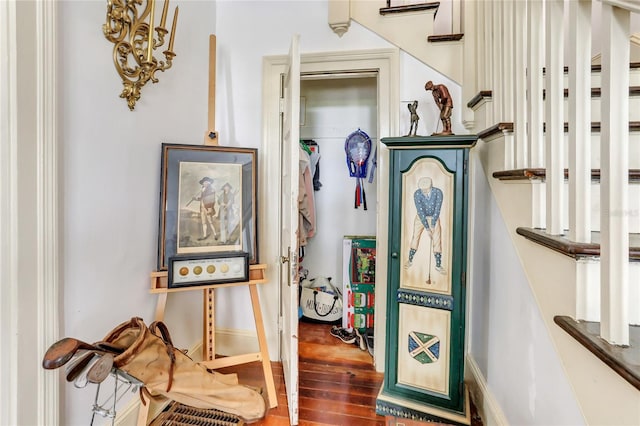 hallway featuring hardwood / wood-style flooring