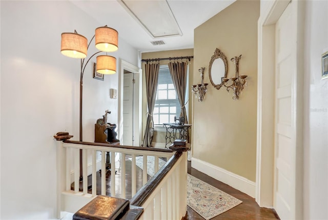 corridor featuring dark hardwood / wood-style floors