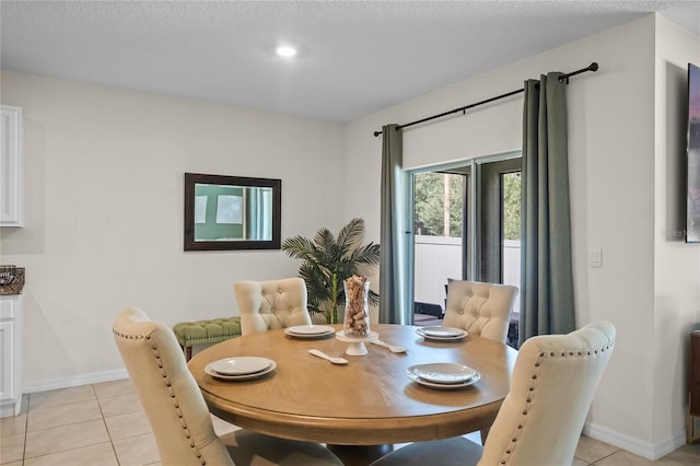 view of tiled dining space