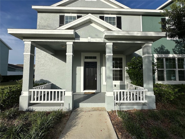 property entrance with a porch