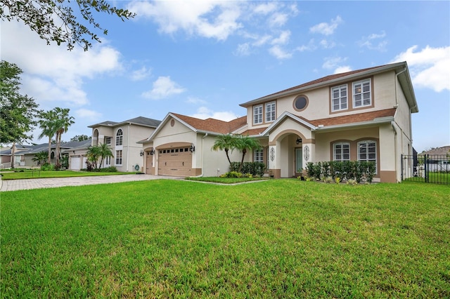 view of front facade featuring a garage and a front yard