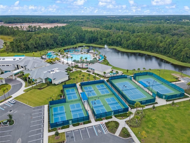 birds eye view of property with a water view