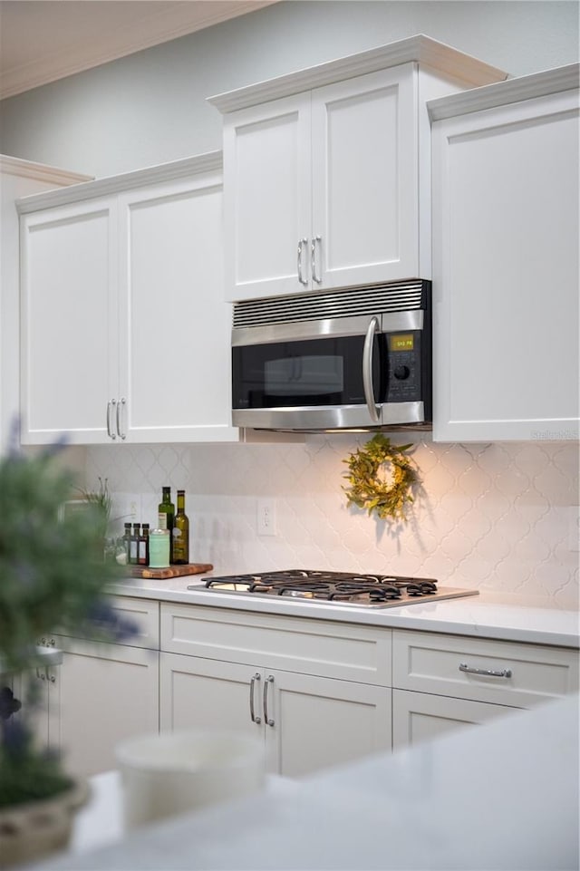 kitchen featuring white cabinets and stainless steel appliances