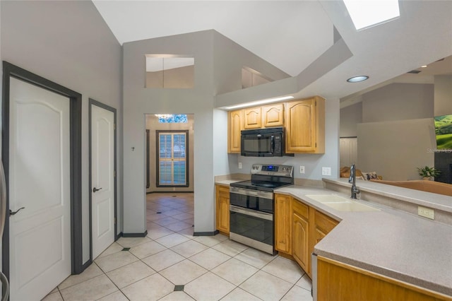 kitchen featuring electric stove, kitchen peninsula, light tile patterned floors, sink, and high vaulted ceiling