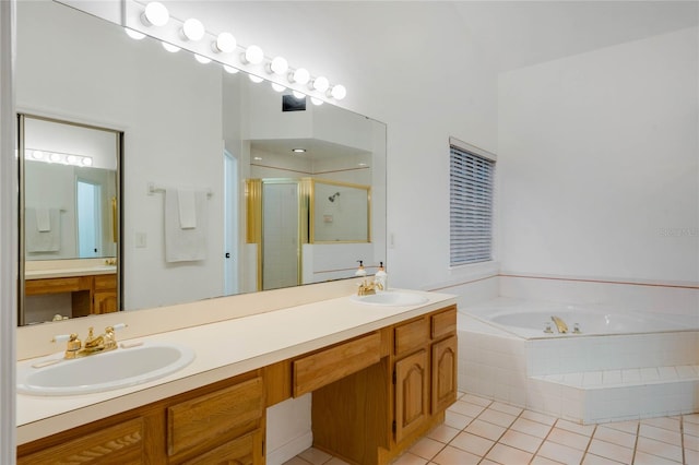 bathroom with vanity, shower with separate bathtub, and tile patterned floors