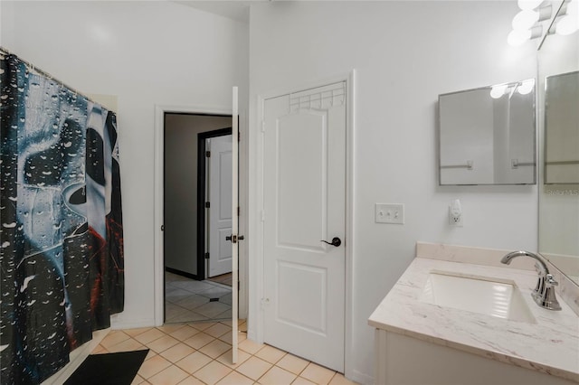 bathroom with vanity and tile patterned floors