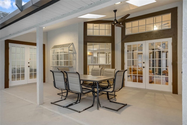 exterior space featuring ceiling fan, beam ceiling, and french doors