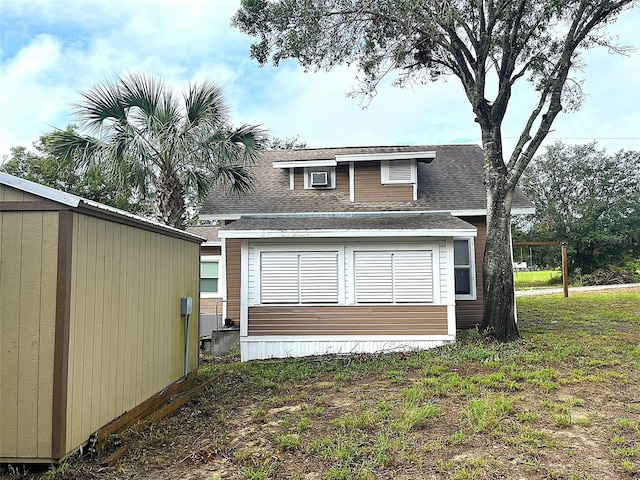 view of property exterior featuring a lawn