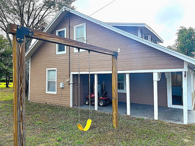 view of property exterior featuring a yard