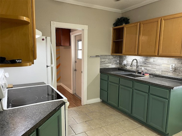 kitchen with crown molding, backsplash, light tile patterned floors, stove, and sink