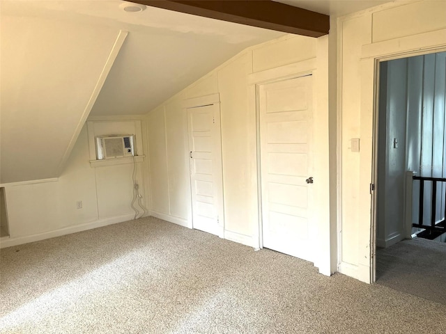 bonus room featuring vaulted ceiling with beams and carpet floors