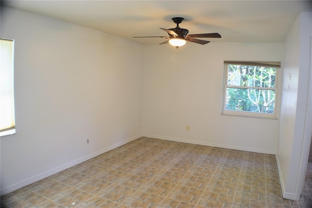 empty room featuring ceiling fan