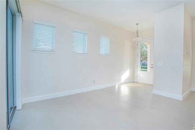 view of tiled spare room