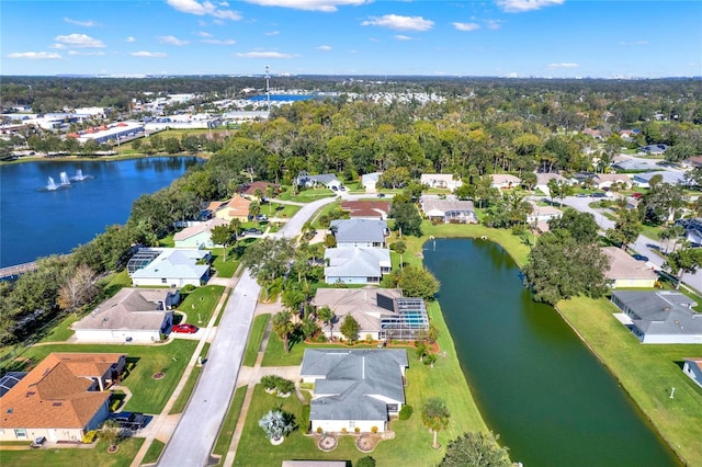 drone / aerial view with a water view