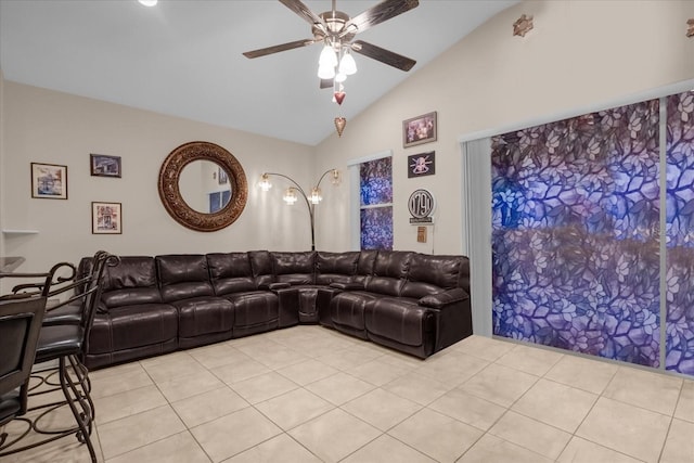 4001 Scarlet Branch Rd, Orlando, FL 32824 - living room with lofted ceiling, ceiling fan, and light tile patterned flooring