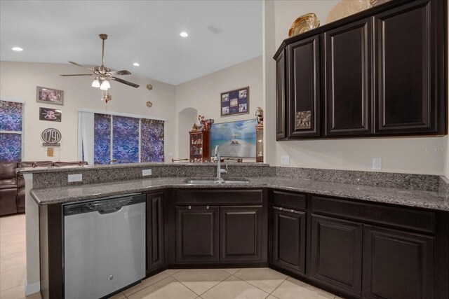 4001 Scarlet Branch Rd, Orlando, FL 32824 - kitchen with dishwasher, a sink, a ceiling fan, dark stone counters, and light tile patterned floors