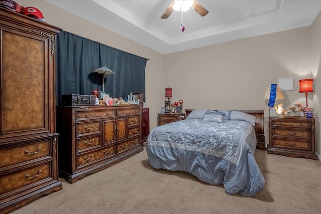 4001 Scarlet Branch Rd, Orlando, FL 32824 - carpeted bedroom with a raised ceiling and ceiling fan