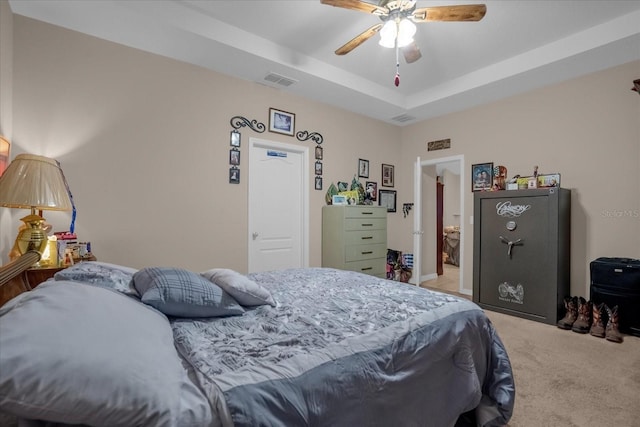 4001 Scarlet Branch Rd, Orlando, FL 32824 - bedroom with light carpet, a raised ceiling, and ceiling fan