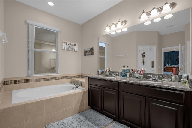 4001 Scarlet Branch Rd, Orlando, FL 32824 - bathroom with a garden tub and double vanity