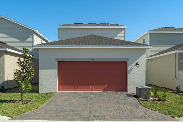 garage featuring central air condition unit