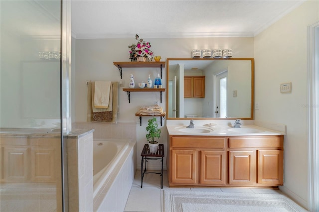 bathroom with vanity, tile patterned flooring, ornamental molding, and tiled tub