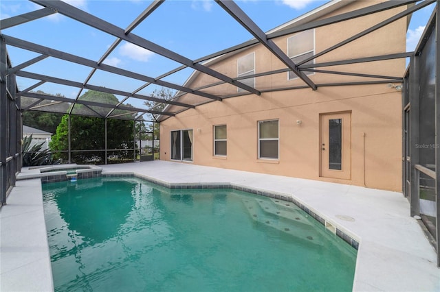 view of swimming pool featuring a patio, glass enclosure, and an in ground hot tub