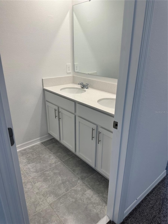 bathroom featuring vanity and tile patterned floors